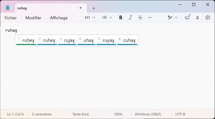 Dans le Bloc-notes de Windows, la barre des propositions sous le mot ruhaɣ